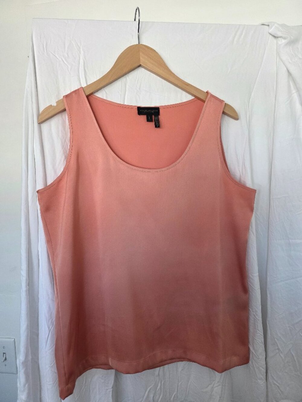 Donna Karan sleeveless top with a scoop neckline